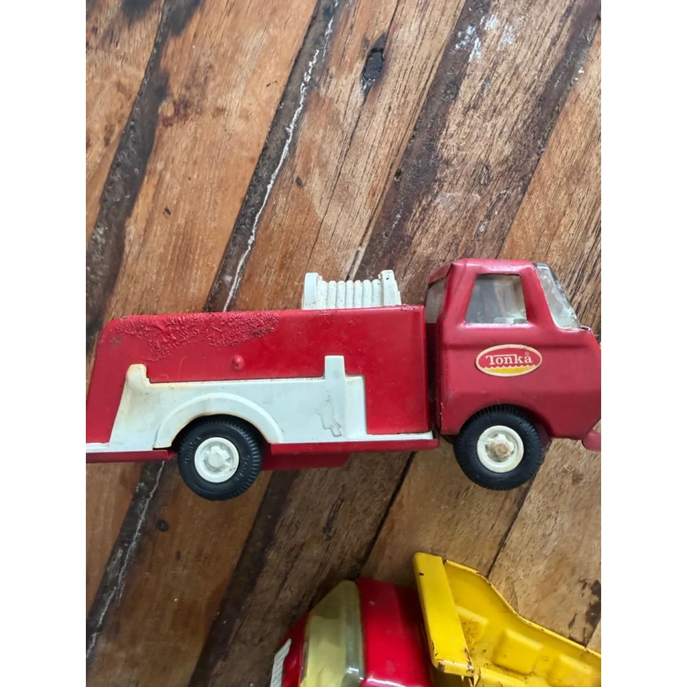 Vintage Tonka fire engine and dump truck Metal Toy Trucks One Size